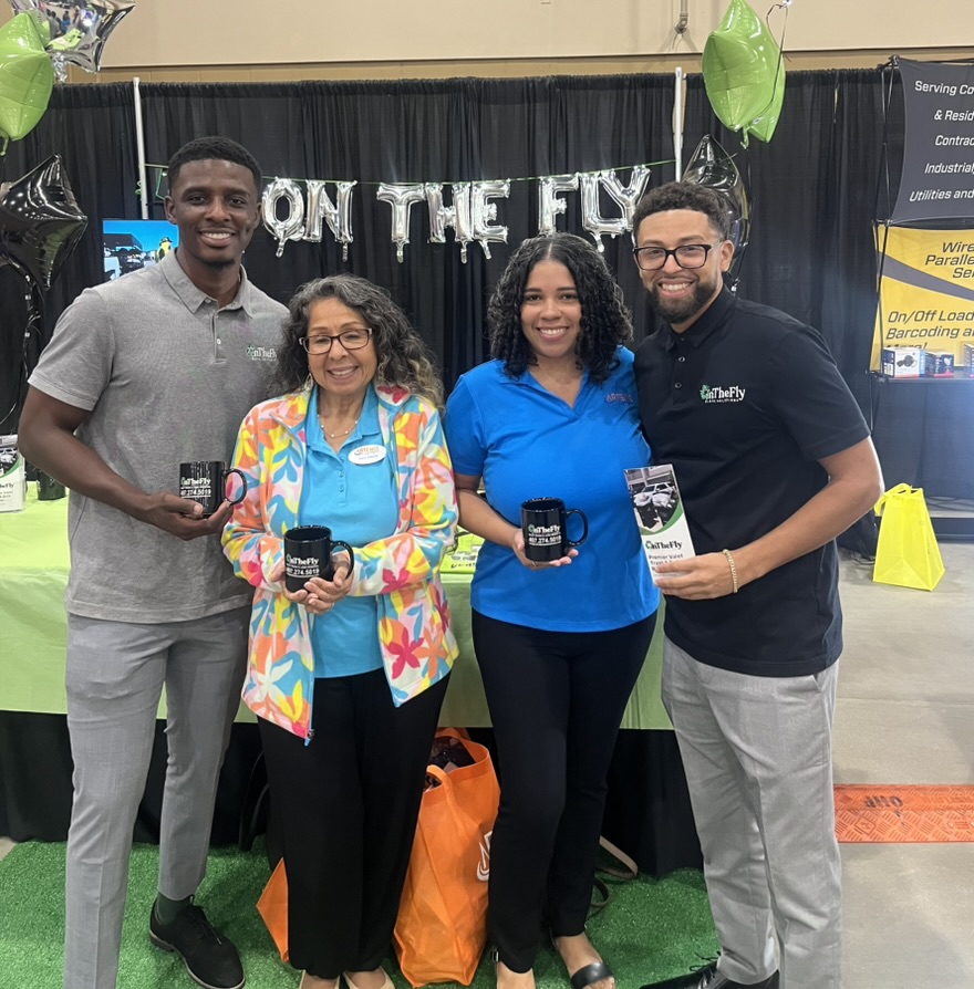 On The Fly Waste Solutions team at trade show